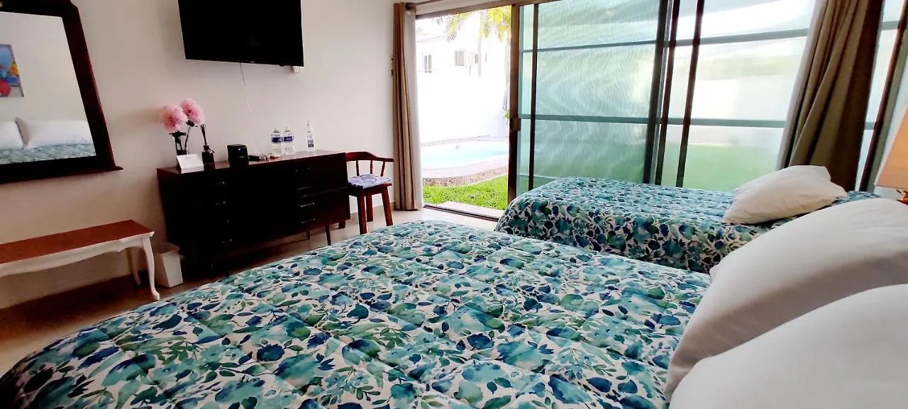 Проживание в семье Casa Abril Cozzy Suites Канкун Мексика